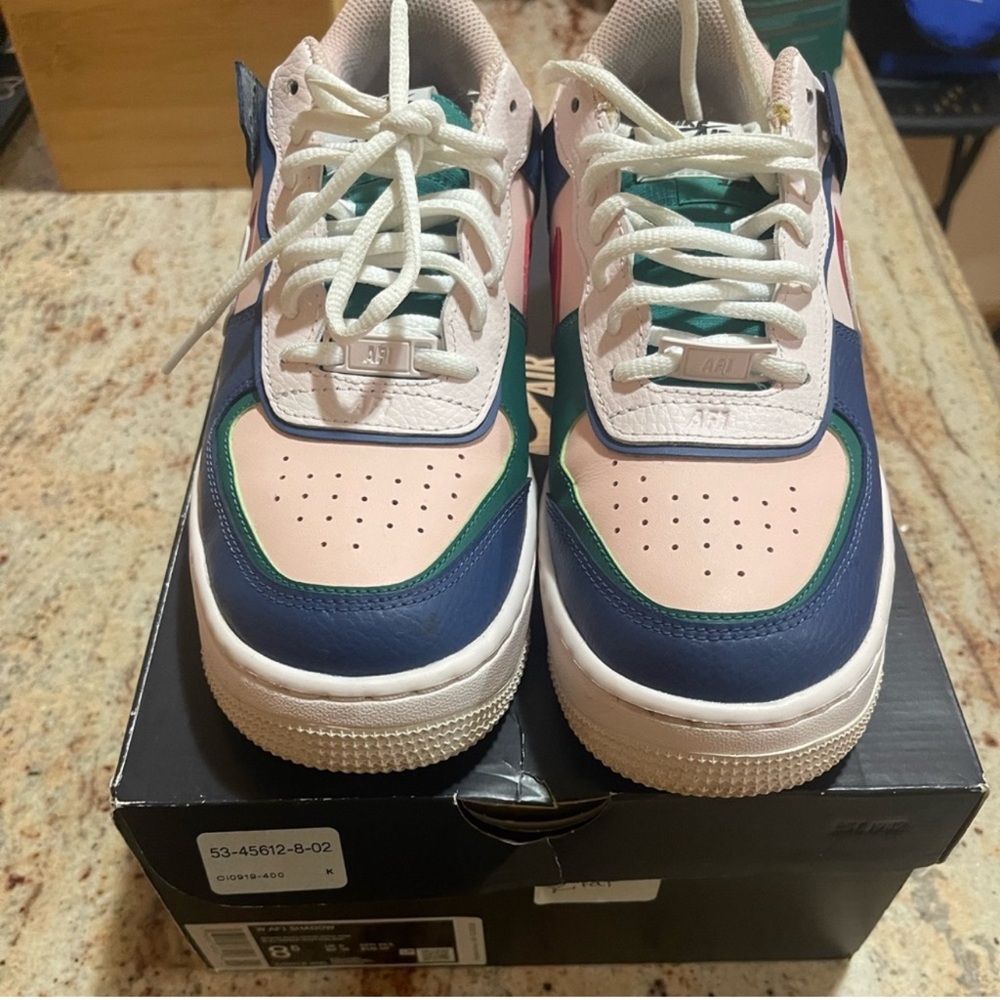 Nike Sneakers with Light Pink Soles